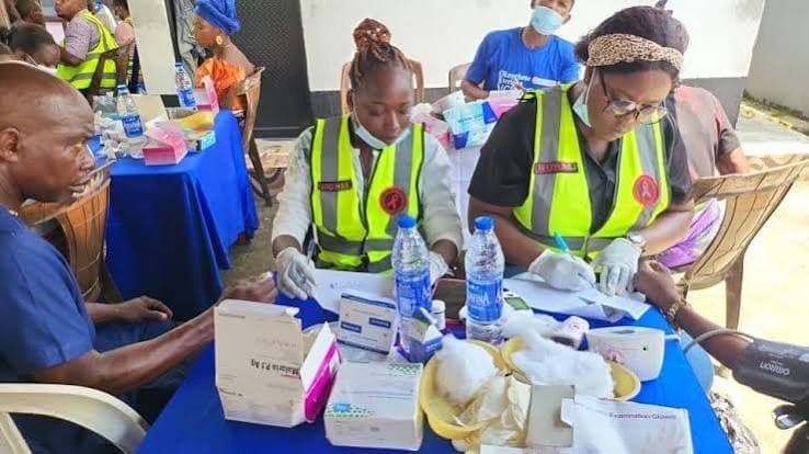 Reliable Sisters Relief medical team distributing medicines and screening community members